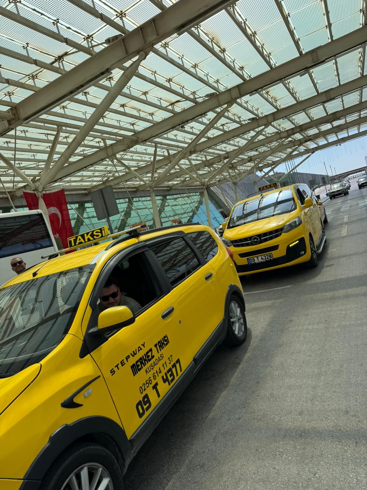 Two Brothers Taxi — both taxis side by side at Izmir Airport