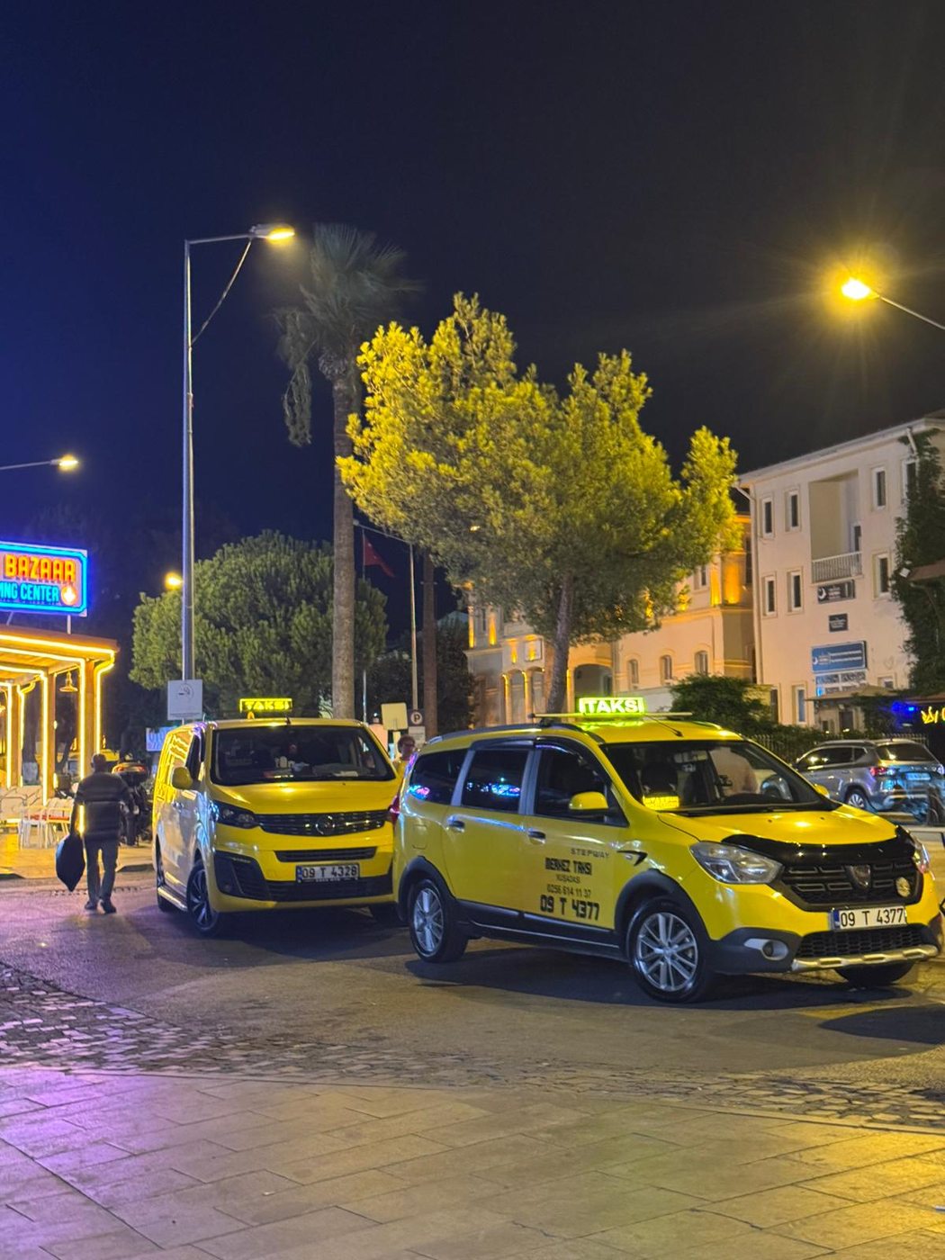Kusadasi taxi stand by night with both Two Brothers cars