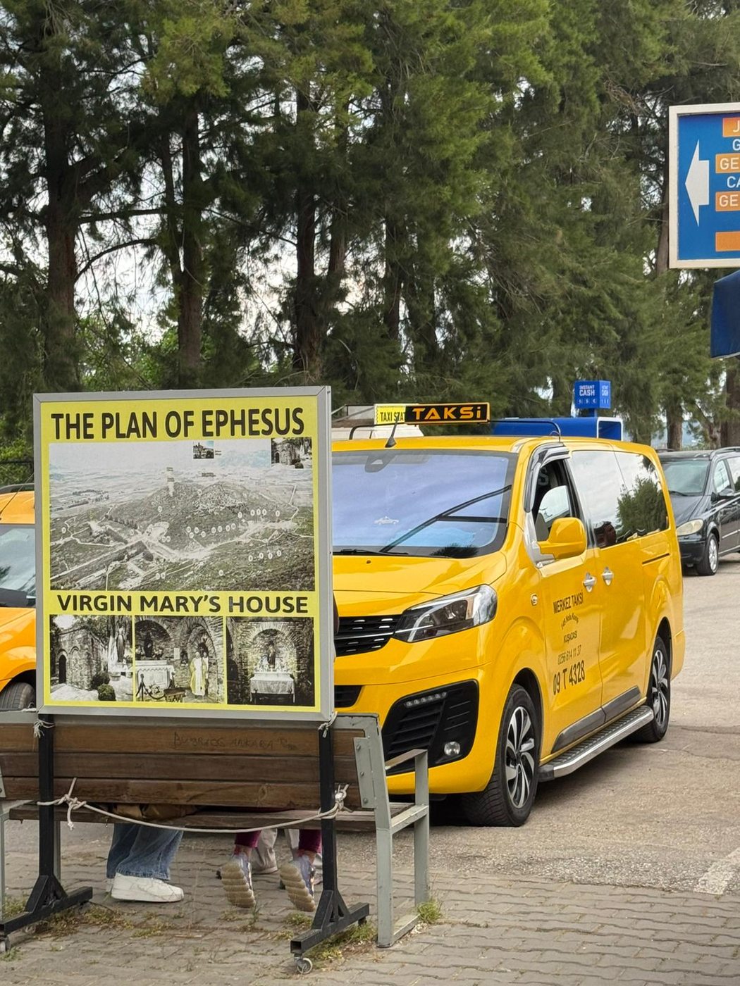 Two Brothers taxi at the Ephesus and Virgin Mary's House sign